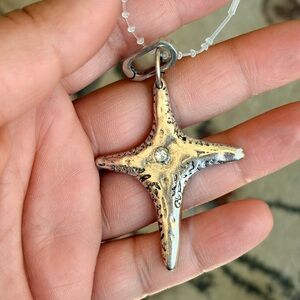 🩶Free People🩶Starburst Cross Pendant/Charm- Antique Silver tone with Clear Stone